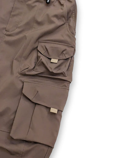 Multi-pocket water-repellent functional pants (mud color)