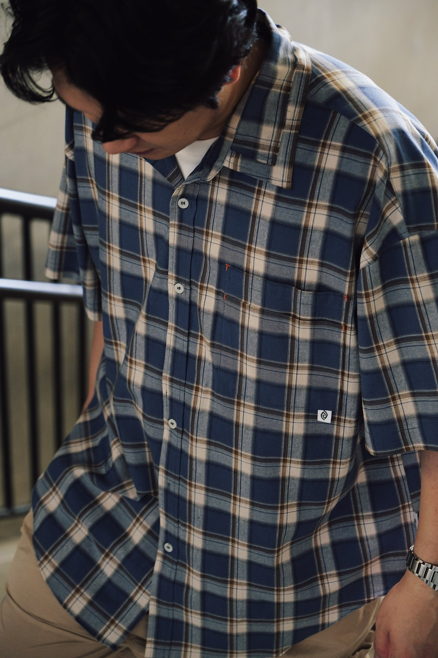 Checkered short-sleeved shirt (blue and white plaid)